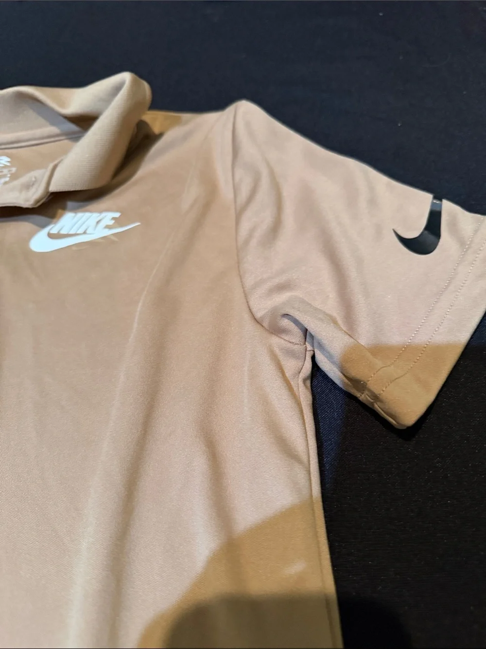 Nike Tan Polo Shirt with White Swoosh